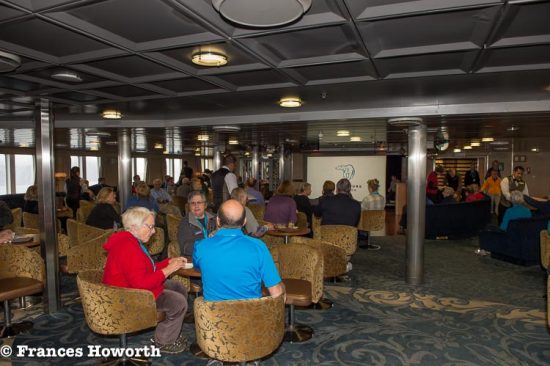 Daily recap and briefing for next day in the Nautilus Lounge aboard Ocean Endeavour